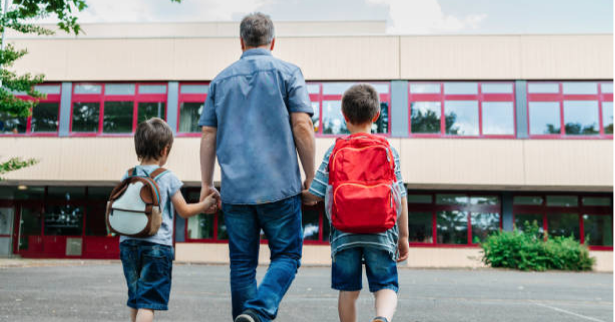 Parents discussing school admissions and child development with teachers at Ayana International School